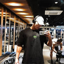 Camiseta de alta qualidade para academia Camiseta masculina folgada com estampa para treinos